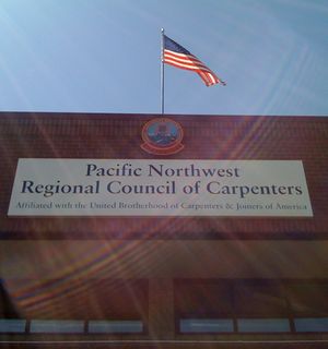 PacificNWCarptersBuildingNowSignCentered.JPG